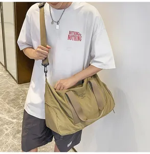 Waterproof canvas travel duffel bag large capacity outdoor shoulder bag for gym student.