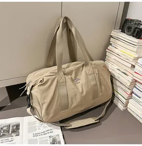 Large capacity canvas duffle bag travel shoulder bag for outdoor sports and daily use.