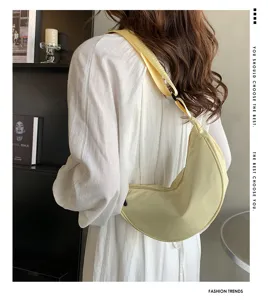 Nylon dumpling crescent crossbody shoulder bag for women, lightweight minimalist half moon purse.