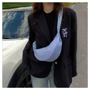 Light blue nylon dumpling crossbody bag, casual crescent shoulder bag for women, stylish daily use.