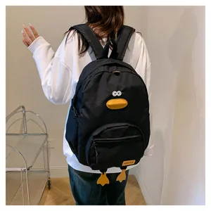 Zaino in tela con papera di cartone animato carino per donne, borsa da scuola casual.