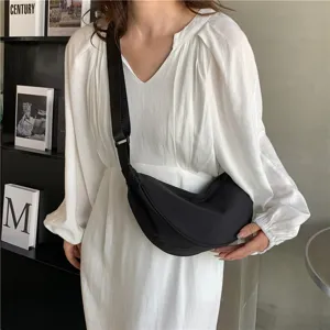 Black nylon crescent crossbody bag, lightweight casual shoulder half moon bag for women.