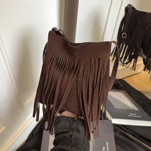 Stylish brown suede fringe crossbody bag for women, retro autumn winter shoulder handbag.