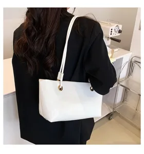 White patent leather shoulder tote bag, stylish underarm commuter handbag for women.