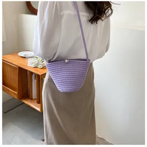 Stylish purple woven bucket bag with pearl accent for women trendy crossbody bag