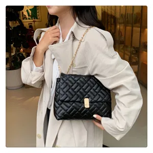 Elegant black quilted chain shoulder bag for women, soft leather underarm purse stylish.