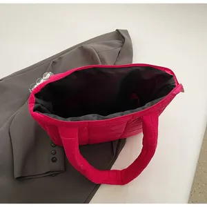 Hot pink quilted down tote bag for women, trendy winter puffer shoulder bag, stylish casual handbag.