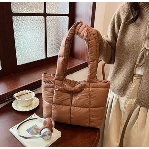 Brown quilted puffer shoulder bag for women, cozy winter tote bag with stylish grid design.
