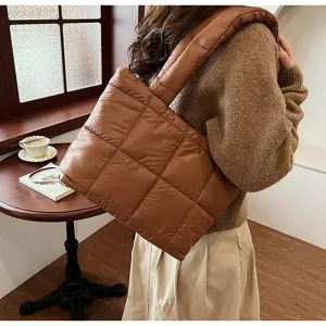Winter new quilted puffer shoulder bag for women, trendy brown padded tote bag detail view.