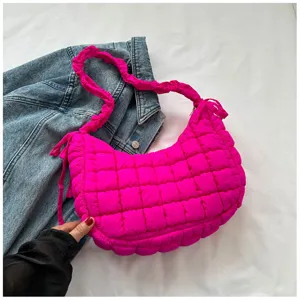 Bright pink quilted puffy shoulder bag with gathered strap for daily trendy design