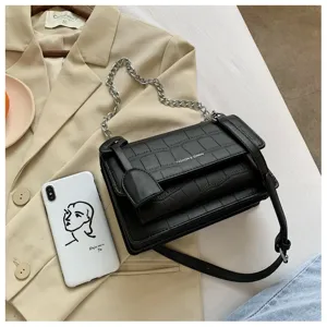 Women black stone pattern shoulder bag fashion casual crossbody bag with chain strap.