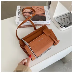 Brown crocodile pattern shoulder crossbody bag with metallic chain strap for women daily wear.