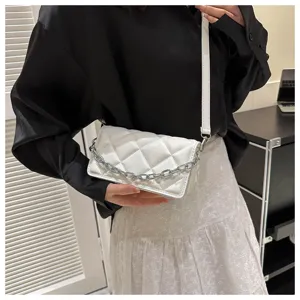 White quilted crossbody bag for women, chic PU leather shoulder handbag with metal chain strap.
