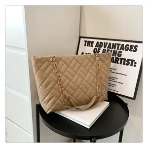 Chic quilted chain tote bag in beige PU leather, stylish large capacity vintage shoulder bag.