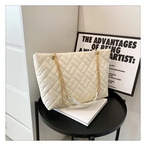 Quilted chain tote bag for women, large capacity stylish shoulder bag, elegant white PU leather.