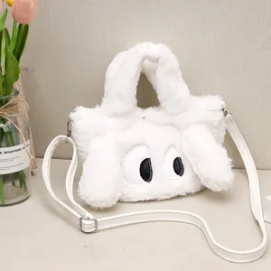 Borsa a mano in peluche bianca per bambini con orecchie soffici e simpatico design di occhi grandi.