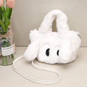 Borsa a mano in peluche bianco per bambini, borsa a tracolla soffice con occhi di cartone.