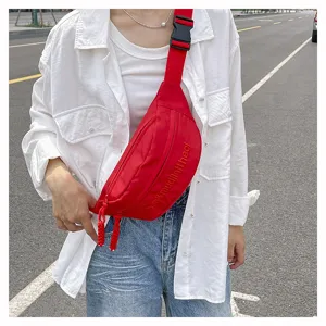 Red street style chest bag, casual canvas crossbody waist bag with adjustable strap and buckle.