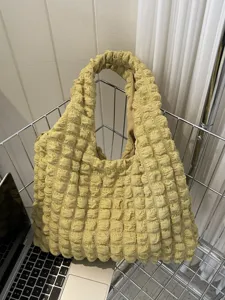 Puffer pleated shoulder bag for women, soft bubble hobo bag with large capacity daily.