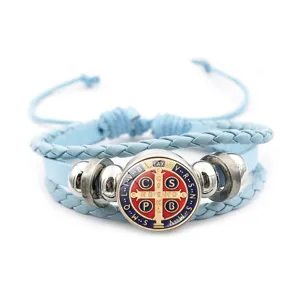 Blue leather braided wrap bracelet with Saint Benedict medal charm and metal beads.