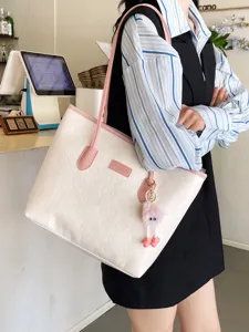 Large capacity colorblock tote bag for women, autumn new embossed fashion shoulder bag.