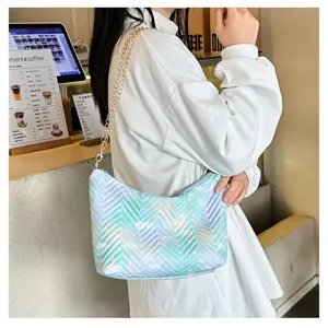 Detailed view of fashionable gradient nylon underarm shoulder bag with chic gold chain strap.