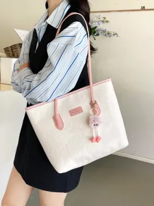 Stylish color-block tote bag for women, large capacity embossed PU shoulder bag.
