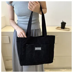 Casual black corduroy tote bag for women, large capacity shoulder bag and stylish handbag.