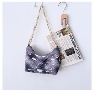 Quilted underarm shoulder bag for women, stylish polyester chic handbag with metal chain strap.
