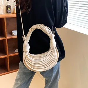 Chic cream white knotted noodle shoulder bag, unique handcrafted hobo handbag for stylish women.