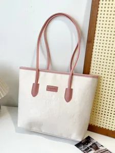 Women color-block tote bag detailed view, stylish embossed design, spacious daily shoulder bag.