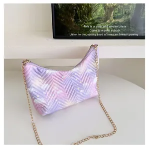 Detailed view of the purple gradient quilted underarm shoulder bag with luxury golden chain.