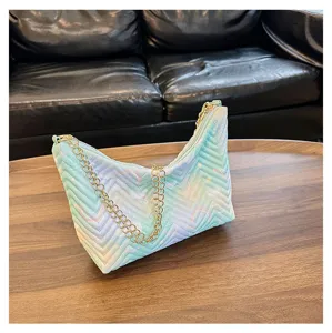 Detailed view of the quilted rainbow nylon underarm shoulder bag with gold chain.