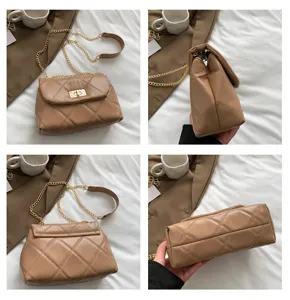 Detailed view of women fashion brown quilted shoulder bag with chain strap and metal lock.