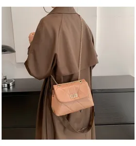 Stylish quilted chain shoulder bag for women, elegant commuter crossbody bag with chic lock design.
