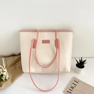 Large capacity contrast color tote bag for women, stylish PU leather shoulder bag for commuting.