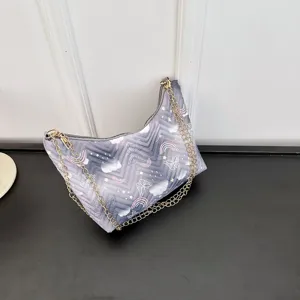 Stylish nylon underarm shoulder bag for women, quilted design with cute print and chain.