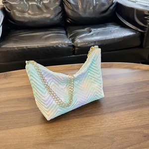 Chic quilted underarm shoulder bag for women, stylish gradient design with gold chain.