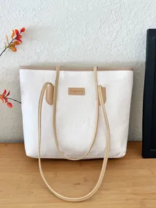 Large capacity contrast color women tote bag autumn new embossed shoulder commuter bag