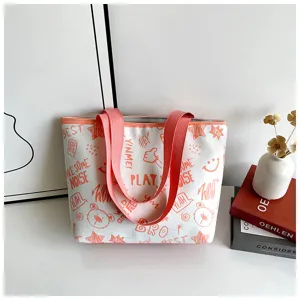 Simple white canvas tote bag with pink straps and cute doodle prints, large capacity commuter bag.
