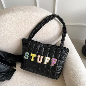 Black quilted puffer tote bag with colorful embroidered letters, trendy shoulder bag for women.