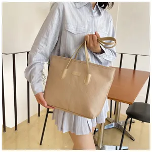 Large capacity women tote bag, stylish embossed design, casual shoulder bag for daily commuting.