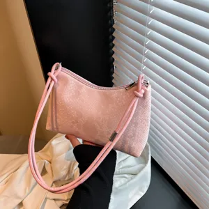Pink snake pattern shoulder underarm bag for women, stylish commuter daily handbag accessory.