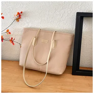 Beige embossed large capacity tote bag for women, stylish PU leather shoulder bag for daily commuting.