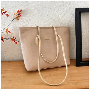 Beige embossed large capacity tote bag, stylish shoulder bag detail view, casual commute.