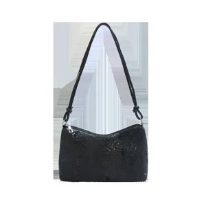 Black sequin shoulder bag for women, stylish underarm handbag with zipper and slim strap.