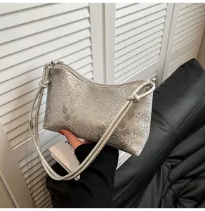 Silver metallic shoulder underarm bag with knot strap detail, stylish women handbag