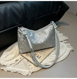 Silver metallic snake print shoulder bag stylish hobo purse for women daily commute chic.
