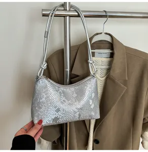 Silver metallic sequin shoulder bag detail, stylish underarm bag for women's daily commute.