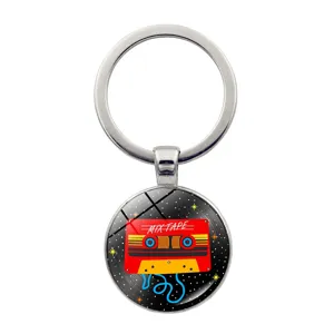 Retro music cassette tape keychain with glass pendant, stylish music gift and accessory.